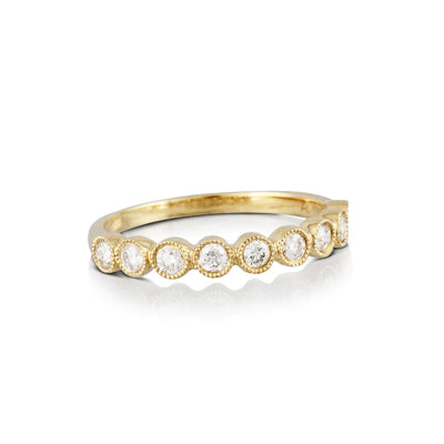 18K Yellow Gold 9 Diamonds Ring with a total diamond weight of .35cts.